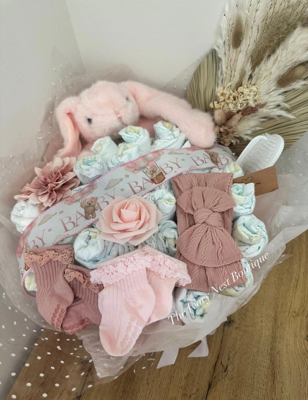 The sweetest welcome  for a new baby girl - Nappy Bouquet & baby essentials
